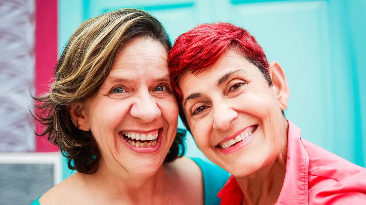 LGBTQ+ couple smiling | Pride in Senior Care | SAGE Platinum Certified Provider