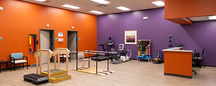 Physical therapy room with equipment